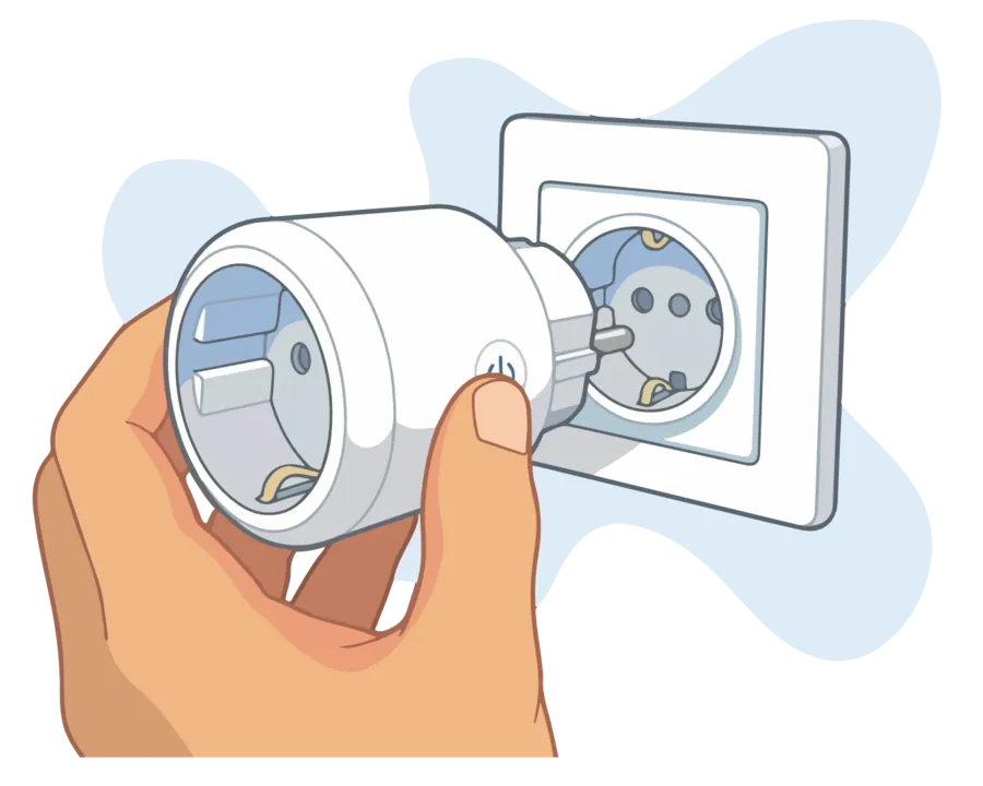 Hand steckt den laundrify Adapter in die Steckdose